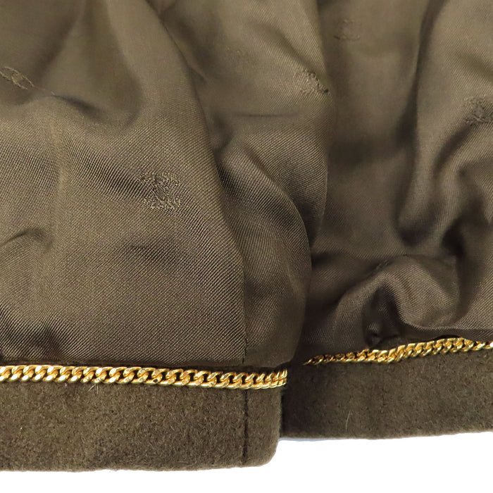 CHANEL 
96A Boutons Coco CC en laine vintage à simple boutonnage 
Veste avec boutons gripoire Coco