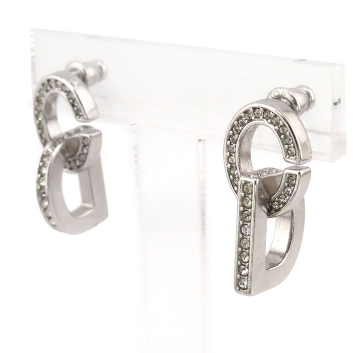 Dior  
Boucles d'oreilles CD LOCK en métal couleur argent avec logo et strass