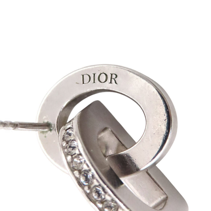 Dior  
Boucles d'oreilles CD LOCK en métal couleur argent avec logo et strass