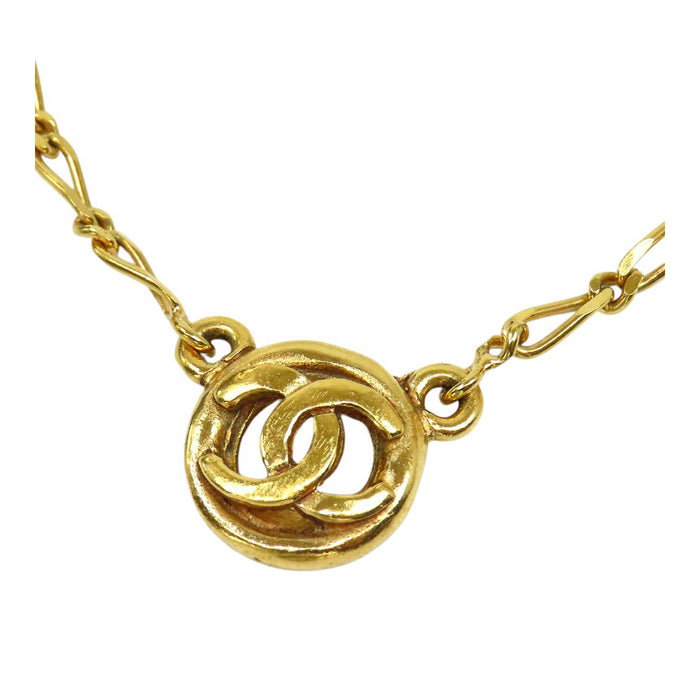 CHANEL  
COCO CC Cercle Logo Métal Couleur Or  
Collier Rond Vintage Coco Mark