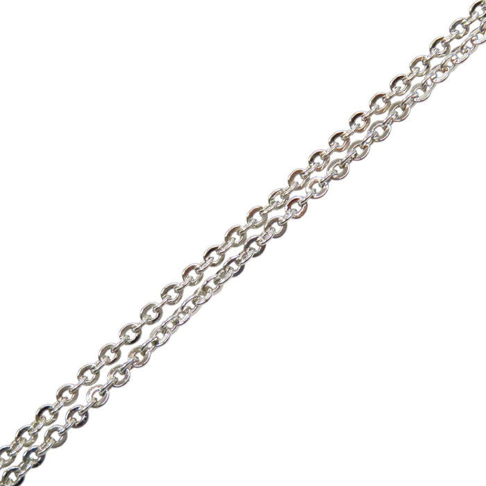 Dior  
Logo Trotter metallo color argento con strass colorati  
Collana con logo e strass