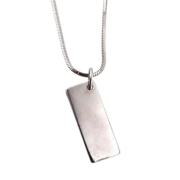 Dior  
Collier plaque Trotteur numéro 2 en métal couleur argent