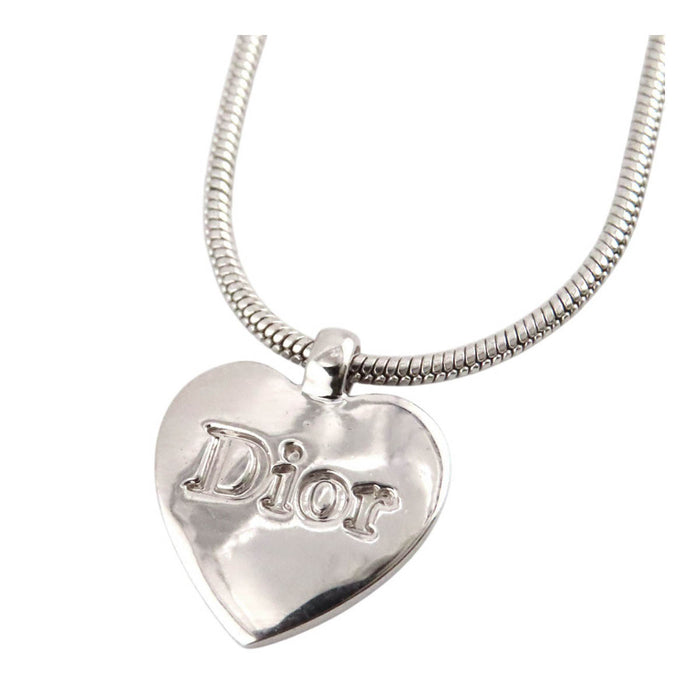 Dior 
Collier cœur logo vintage en métal couleur argent