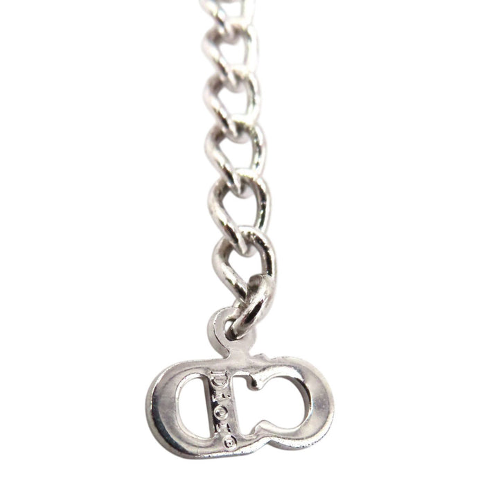 Dior 
Collier cœur logo vintage en métal couleur argent