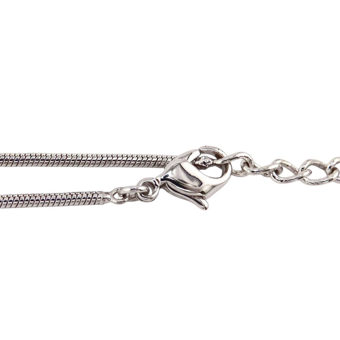 Dior 
Collier cœur logo vintage en métal couleur argent