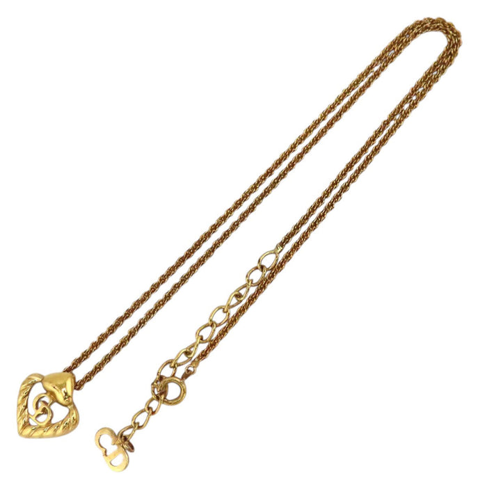 Dior  
Collier cœur logo en métal doré vintage