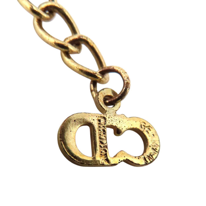 Dior  
Collier cœur logo en métal doré vintage