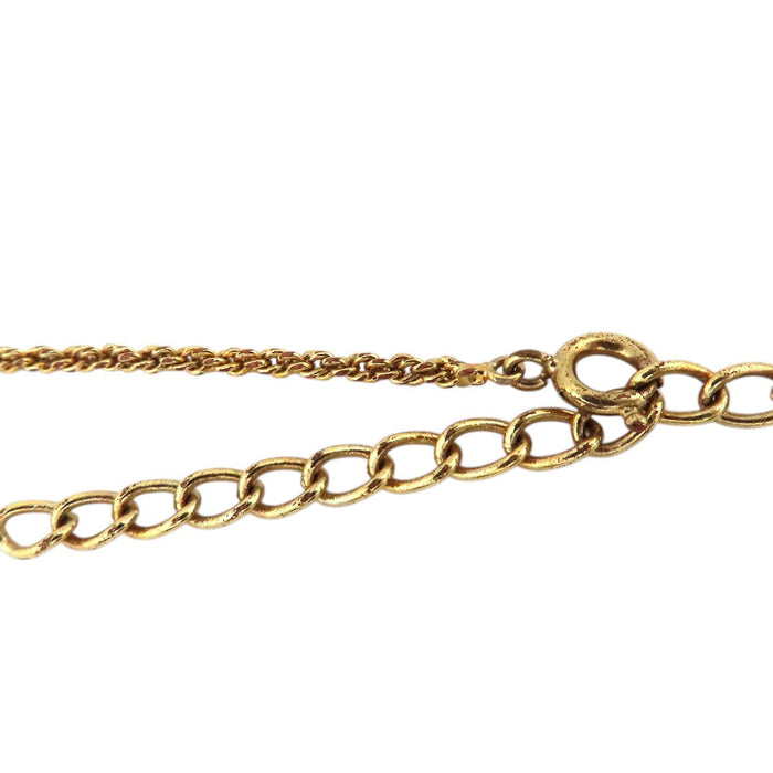 Dior  
Collier cœur logo en métal doré vintage