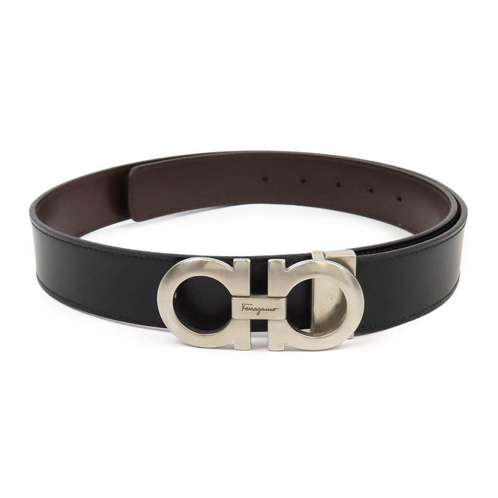 Salvatore Ferragamo  
Cintura reversibile in pelle con doppio Gancini in metallo color argento