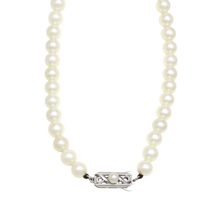 MIKIMOTO 
Set collana e orecchini con perle Akoya