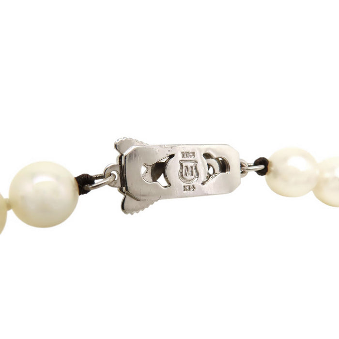 MIKIMOTO 
Set collana e orecchini con perle Akoya