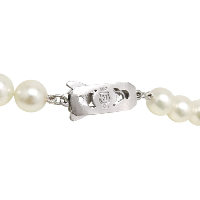 MIKIMOTO 
Collana lunga con perle Akoya