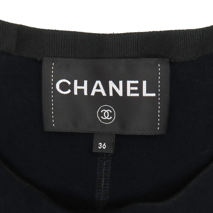 CHANEL  
COCO CC Bouton Coco  
Veste sans col avec logo Coco