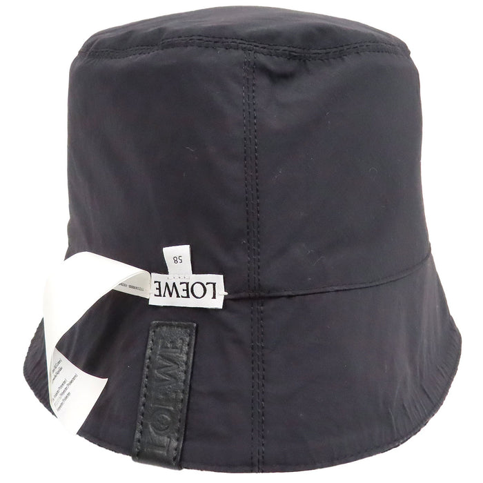 LOEWE 
Cappello a secchiello reversibile in cotone con logo e motivo anagramma