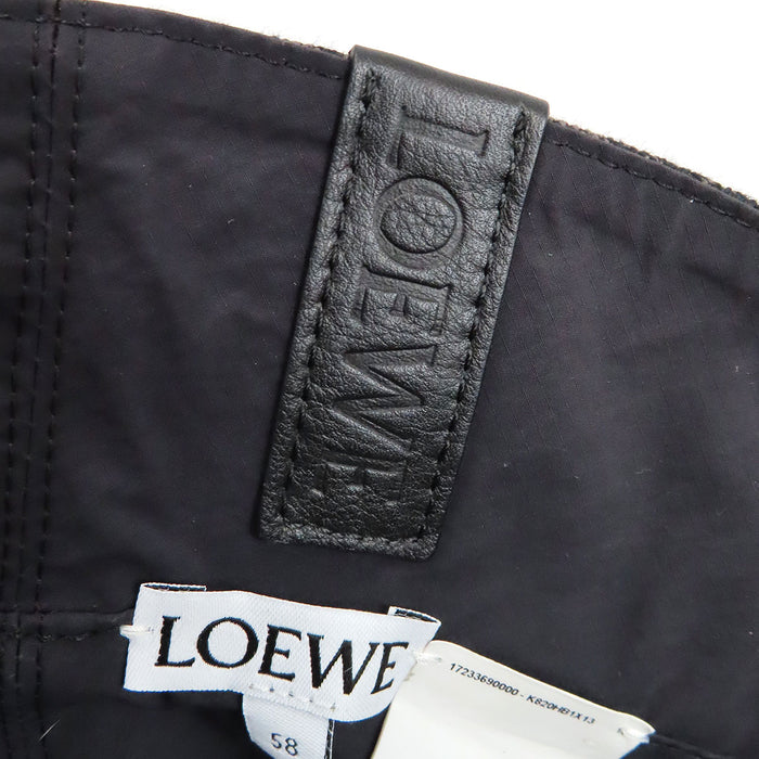 LOEWE 
Cappello a secchiello reversibile in cotone con logo e motivo anagramma