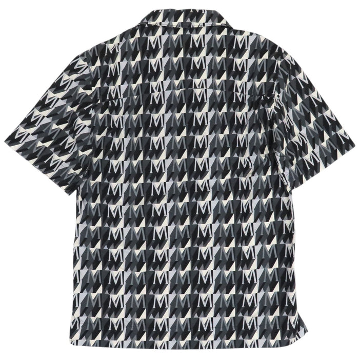 MONCLER 
Chemise à manches courtes en coton avec logo écusson, motif intégral, fabriquée en 2024