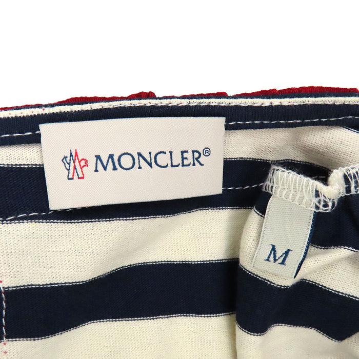 MONCLER 
Patch logo in cotone 
Maglia girocollo a righe con maniche corte