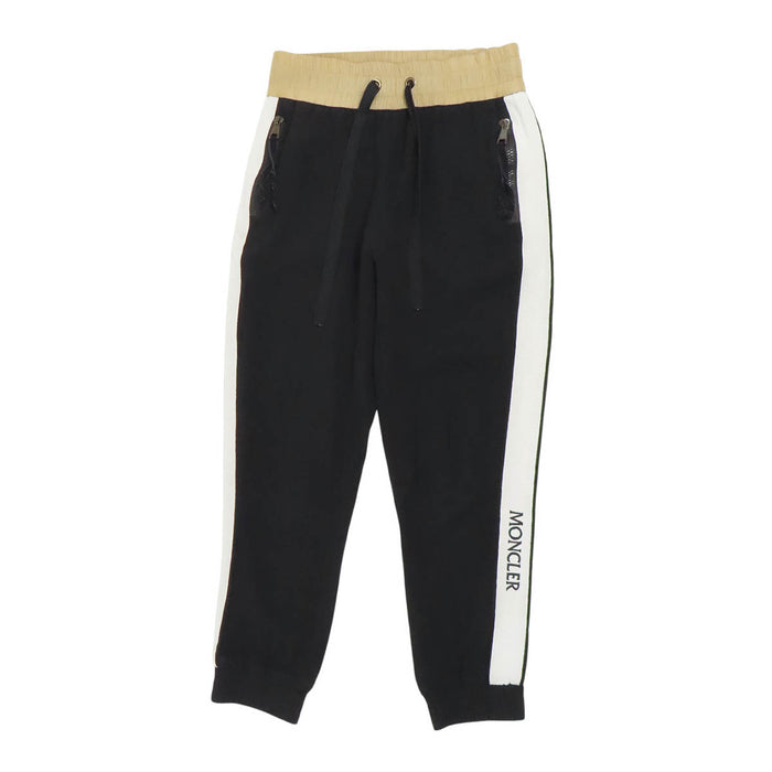 MONCLER
Pantaloni in nylon con logo e banda laterale
Pantaloni da tuta