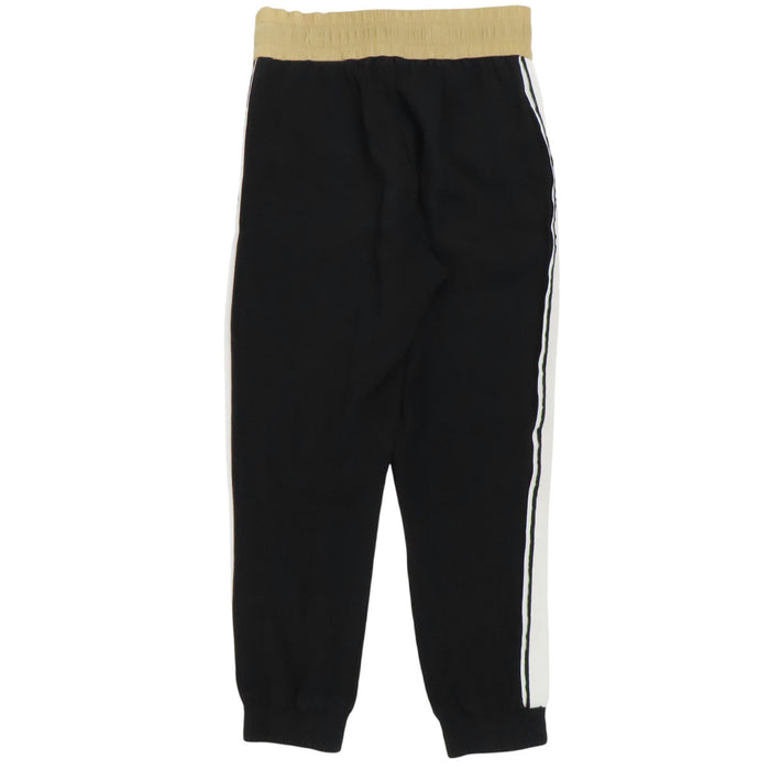 MONCLER
Pantaloni in nylon con logo e banda laterale
Pantaloni da tuta