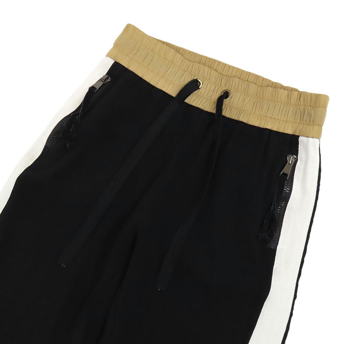 MONCLER
Pantaloni in nylon con logo e banda laterale
Pantaloni da tuta