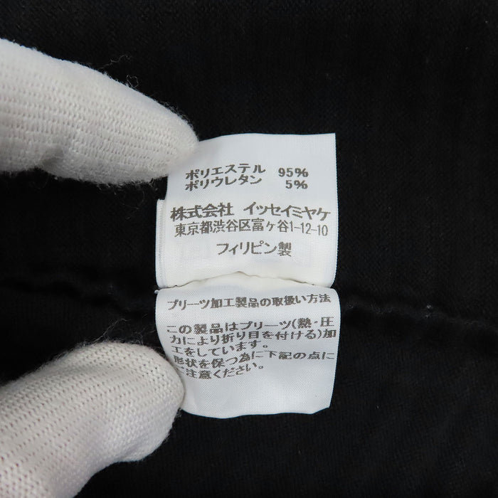 ISSEY MIYAKE  
Silhouette en boîte ISSEY MIYAKE me  
Robe plissée me