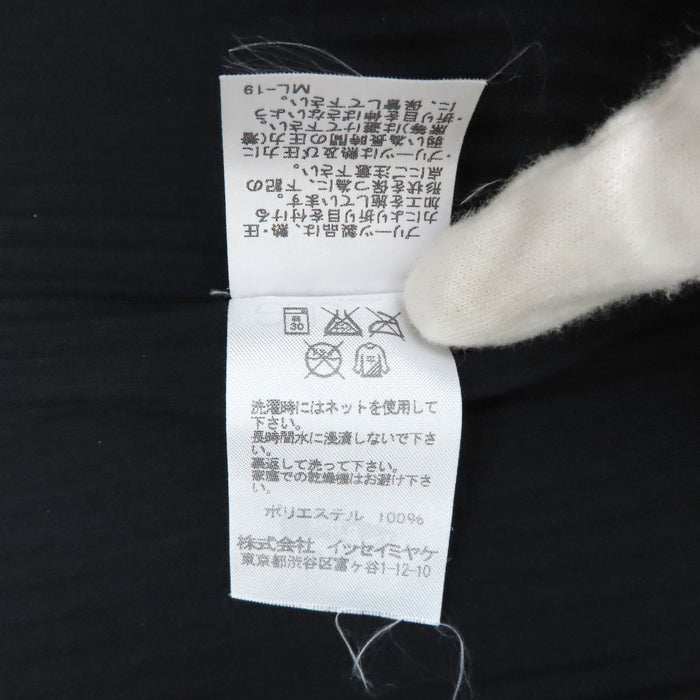 ISSEY MIYAKE
Collo alto Mi
Maglia plissettata me ISSEY MIYAKE