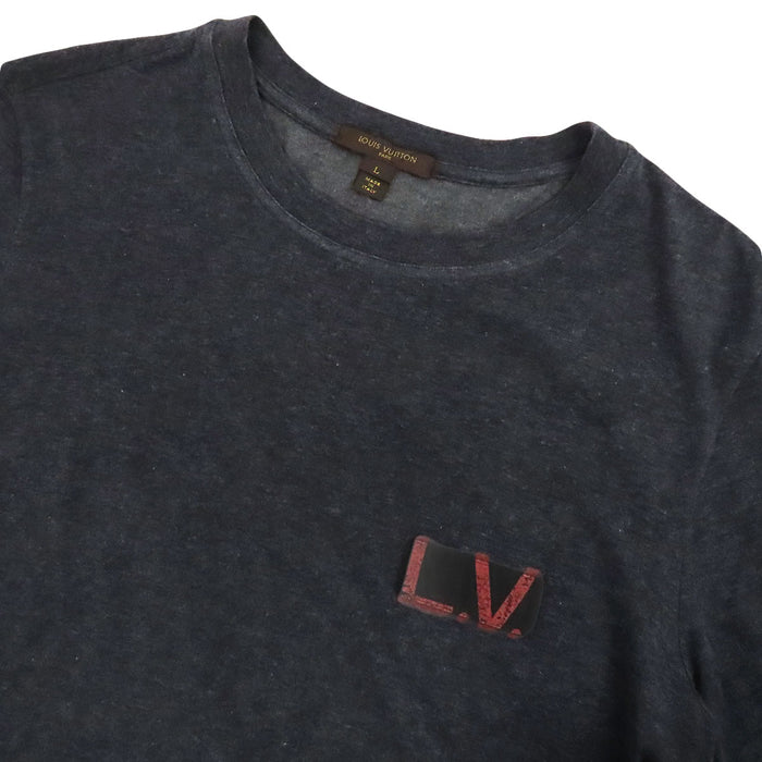 LOUIS VUITTON
Cotone
T-shirt con stampa logo LV