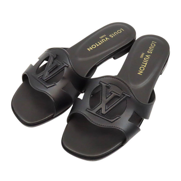 LOUIS VUITTON 
LV Logo Leather Flat Mules 2023 Model 
LV Isola Sandals