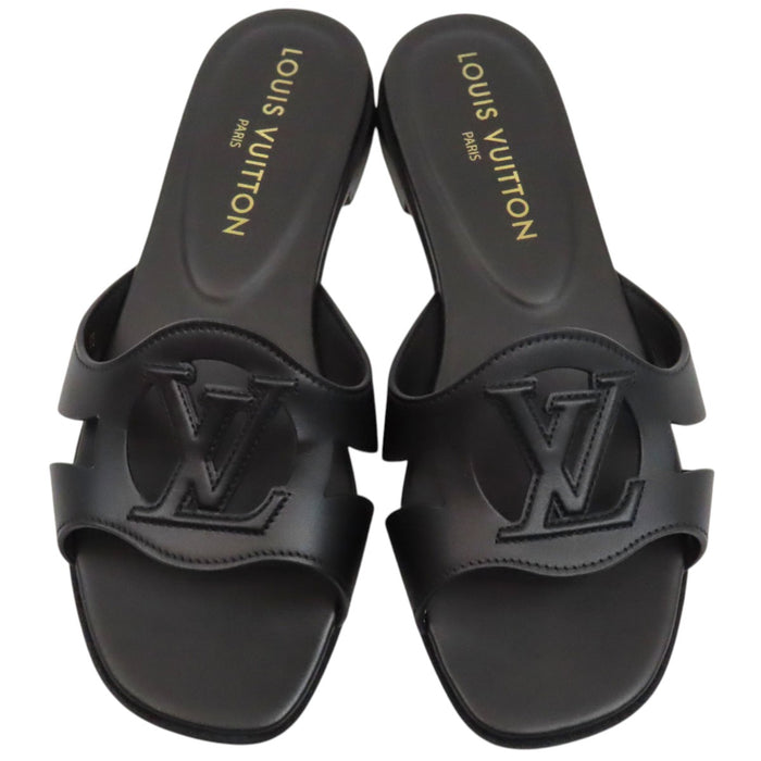 LOUIS VUITTON 
LV Logo Leather Flat Mules 2023 Model 
LV Isola Sandals