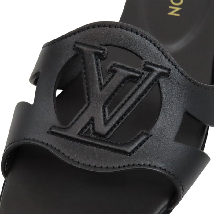 LOUIS VUITTON 
LV Logo Leather Flat Mules 2023 Model 
LV Isola Sandals