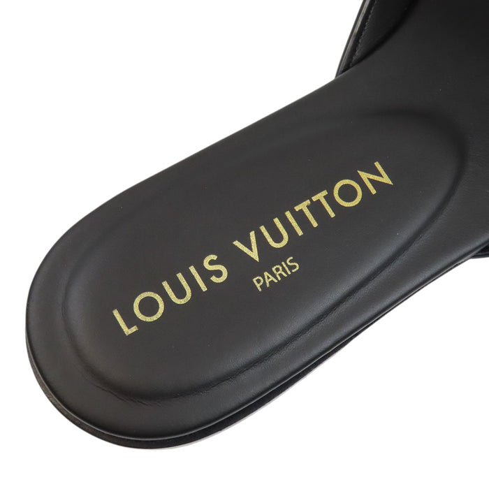 LOUIS VUITTON 
LV Logo Leather Flat Mules 2023 Model 
LV Isola Sandals