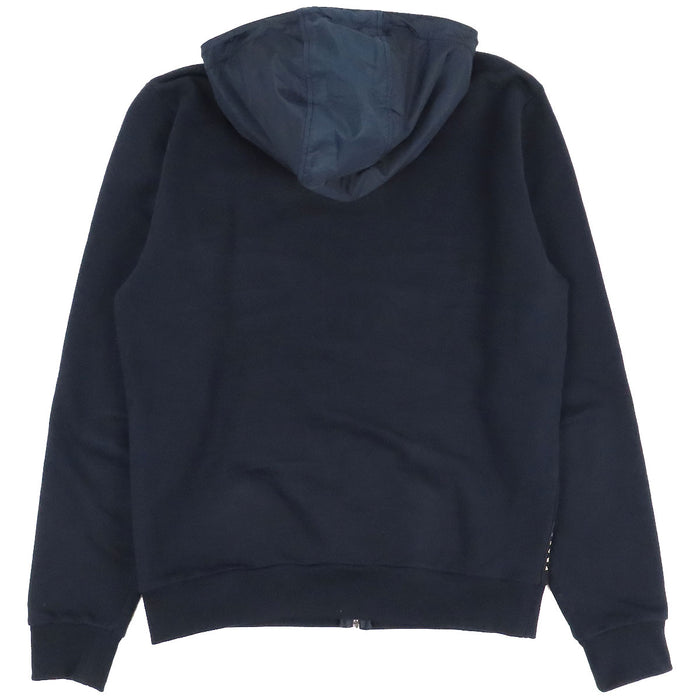 PRADA  
Sweat à capuche en coton avec logo en caoutchouc et empiècements en nylon  
Veste zippée avec logo latéral