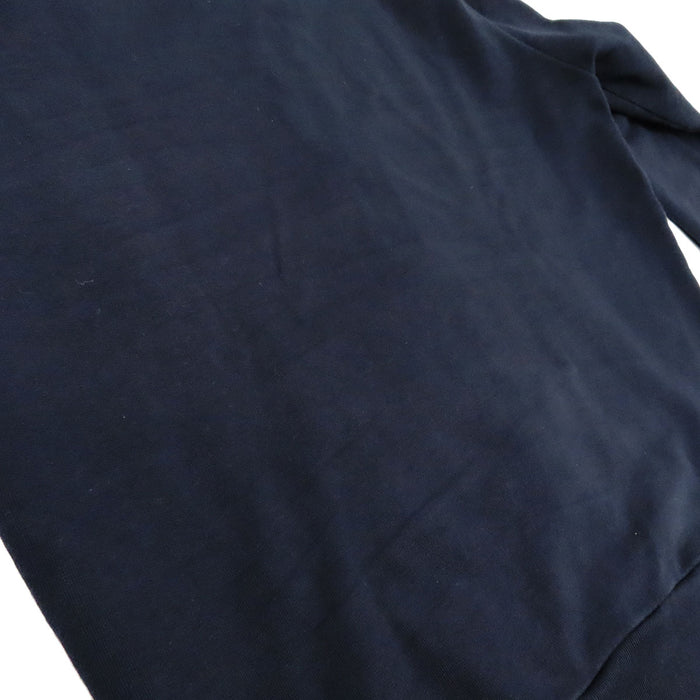 PRADA  
Sweat à capuche en coton avec logo en caoutchouc et empiècements en nylon  
Veste zippée avec logo latéral