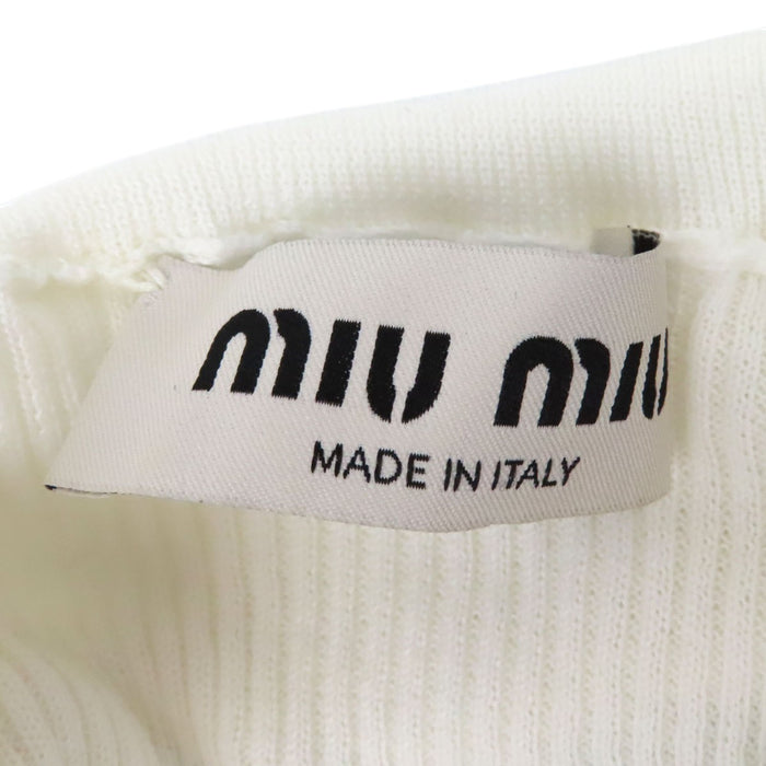 MIUMIU
Coton manches mi-longues
Col roulé à logo en maille côtelée