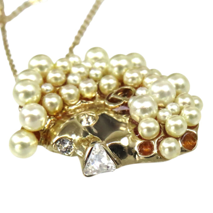 Dior 
Collana Tell Me Dior Leone con logo CD, perle finte, strass e metallo dorato