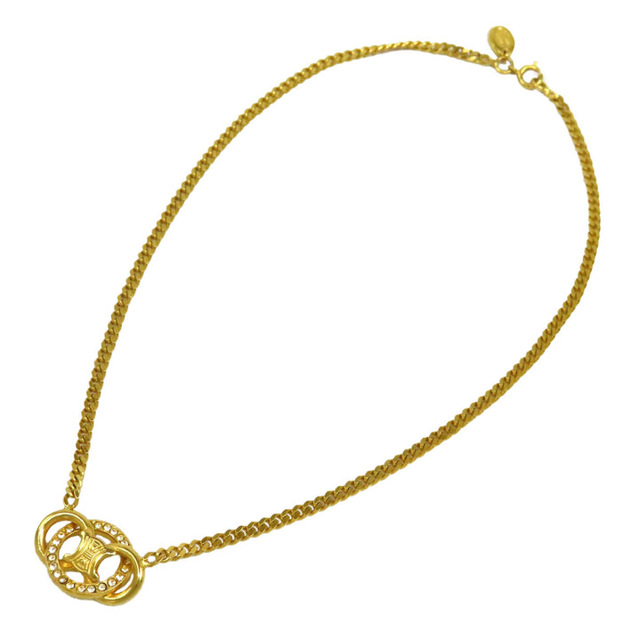 CELINE  
Chaîne en or à maillons plats avec strass et logo en métal doré  
Collier chaîne Macadam