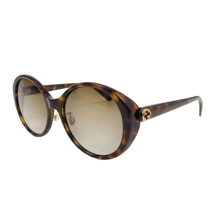 GUCCI 
Lunettes de soleil abeille à motif écaille 
Interlocking G