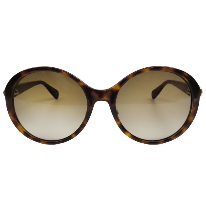 GUCCI 
Lunettes de soleil abeille à motif écaille 
Interlocking G