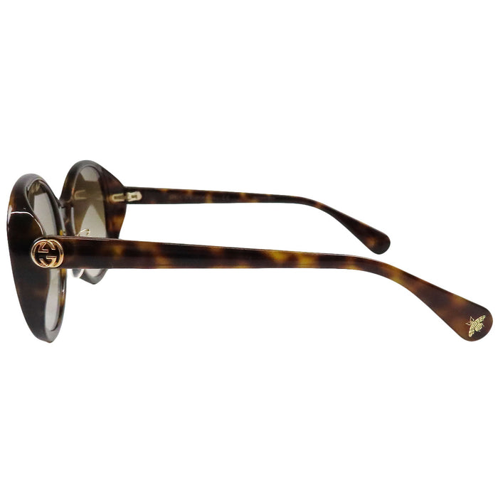 GUCCI 
Lunettes de soleil abeille à motif écaille 
Interlocking G