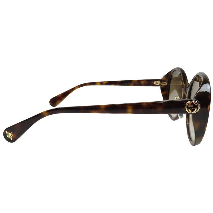GUCCI 
Lunettes de soleil abeille à motif écaille 
Interlocking G