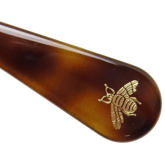 GUCCI 
Lunettes de soleil abeille à motif écaille 
Interlocking G