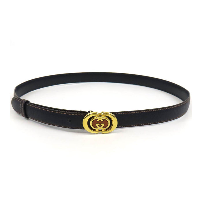 GUCCI 
Ceinture en cuir vintage 
avec logo GG en métal doré