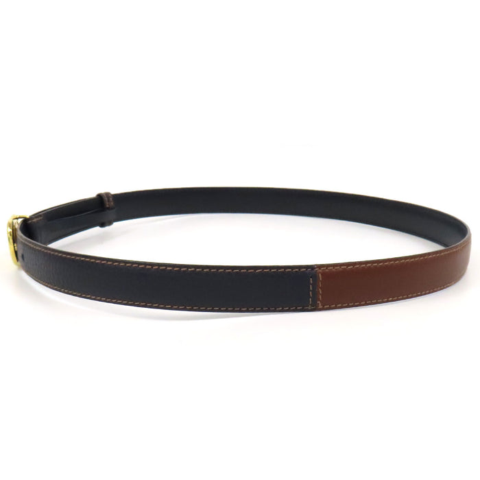 GUCCI 
Ceinture en cuir vintage 
avec logo GG en métal doré