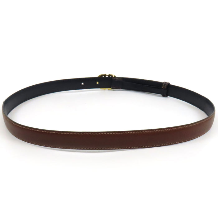 GUCCI 
Ceinture en cuir vintage 
avec logo GG en métal doré