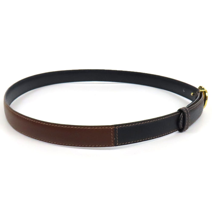 GUCCI 
Ceinture en cuir vintage 
avec logo GG en métal doré