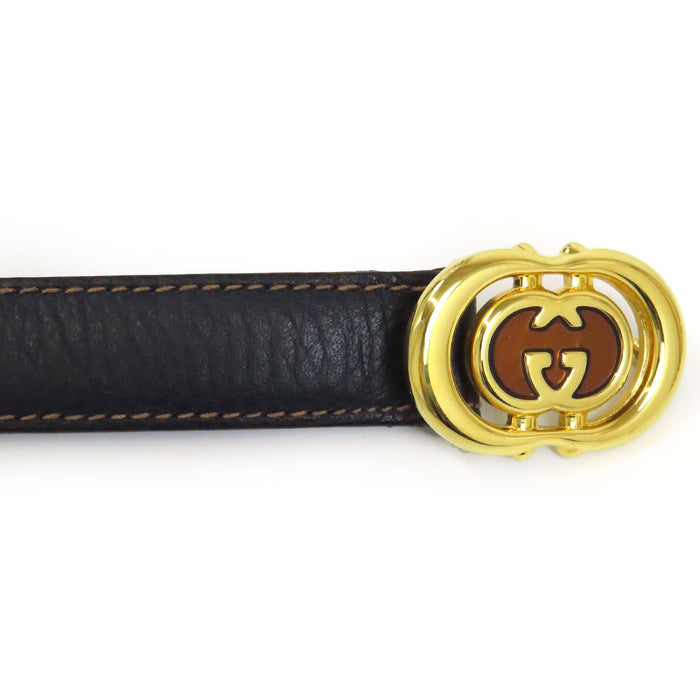 GUCCI 
Ceinture en cuir vintage 
avec logo GG en métal doré