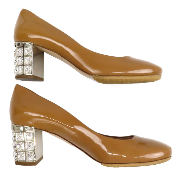 MIUMIU  
Boucles argentées Talon épais  
Escarpins vernis ornés de bijoux