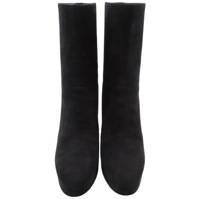 Dior  
Bottes à talon chunky en daim avec fermeture éclair étoile et garniture dorée logo