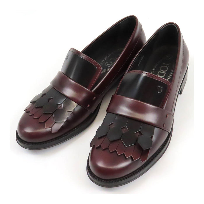 TOD’S 
Mocassins bicolores à franges et bout rond avec logo T