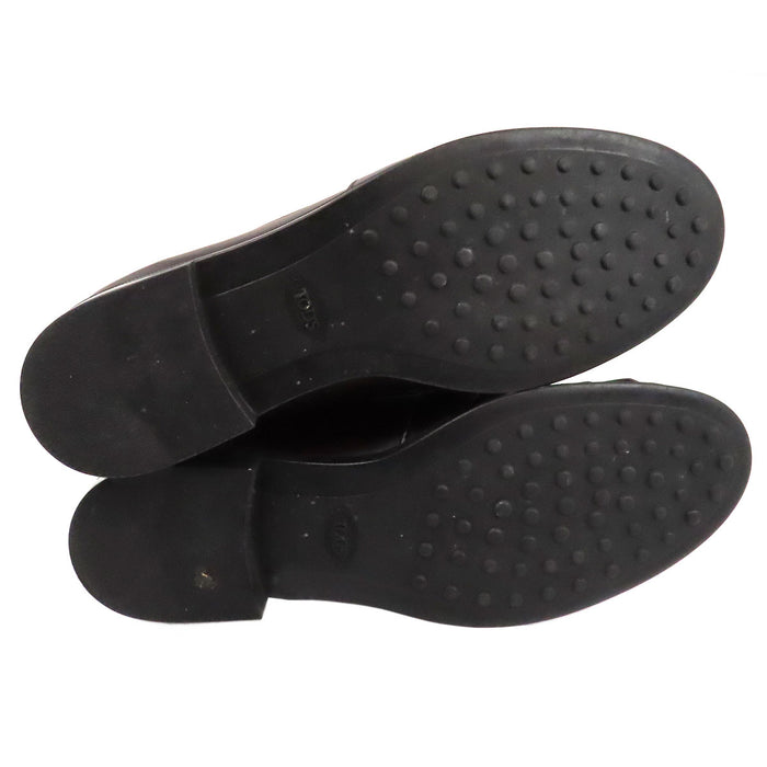 TOD’S 
Mocassins bicolores à franges et bout rond avec logo T